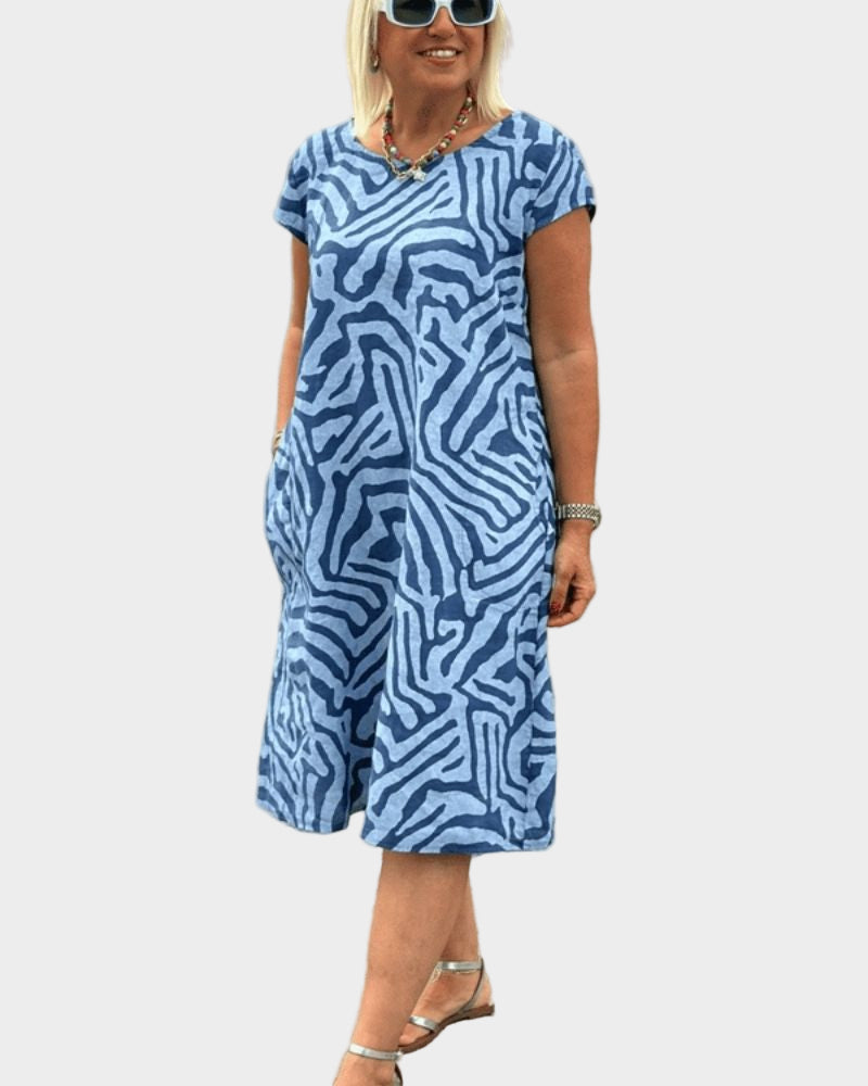 Καλοκαιρινό φόρεμα με στρογγυλή λαιμόκοψη και όμορφο σχέδιο