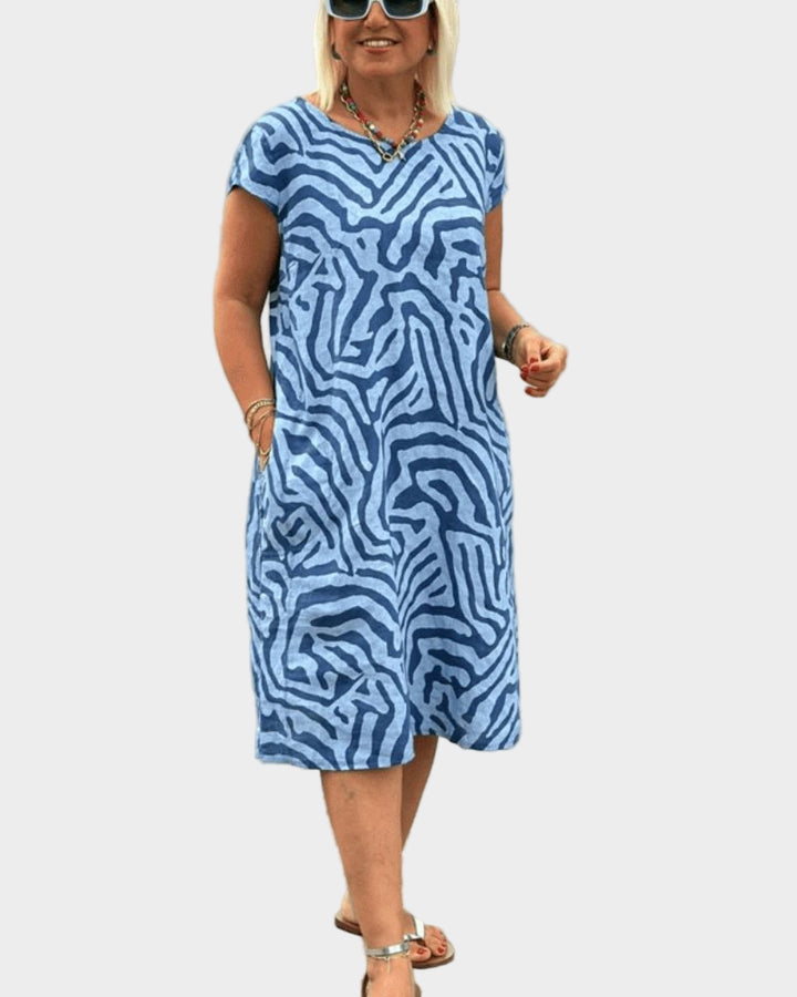 Καλοκαιρινό φόρεμα με στρογγυλή λαιμόκοψη και όμορφο σχέδιο