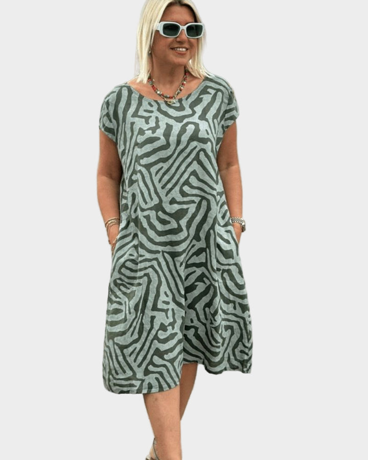 Καλοκαιρινό φόρεμα με στρογγυλή λαιμόκοψη και όμορφο σχέδιο