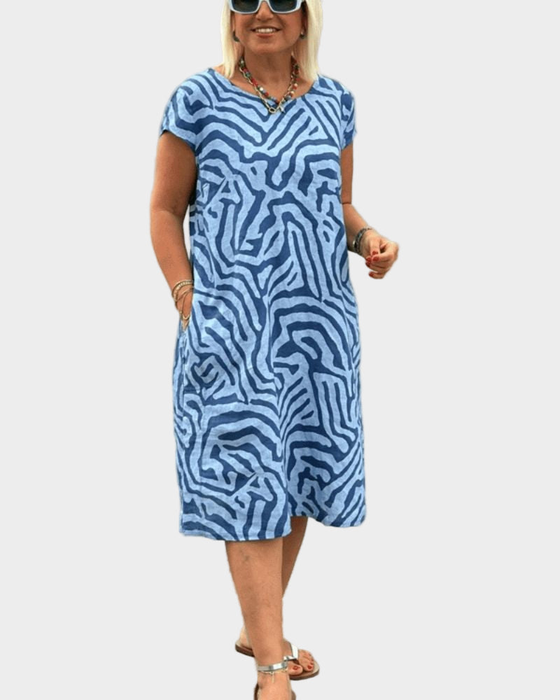 Καλοκαιρινό φόρεμα με στρογγυλή λαιμόκοψη και όμορφο σχέδιο